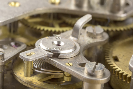 Macro shot of clockwork gears inside the old watch