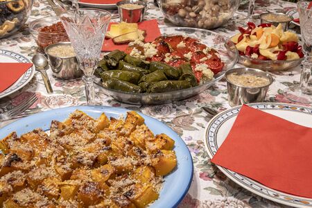 Celebrating Christmas. Colorful decoration table with food ready to eatの写真素材