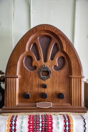 Old retro wooden radio on the table. Vertical viewの写真素材