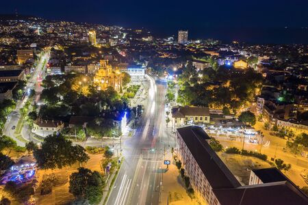 Varna, Bulgaria - October 28, 2019; Aerial view from the drone of the illuminated centrum of Varna city at nightのeditorial素材