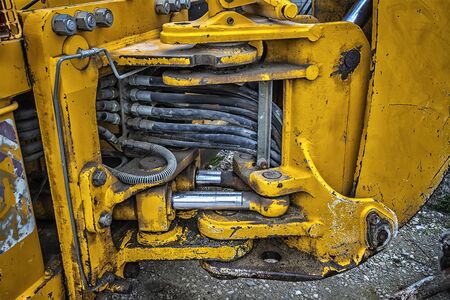 Detail of modern yellow excavator machines. Close upの写真素材
