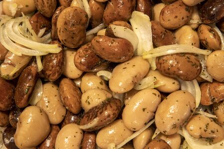 Salad with beans. Natural products. Salad with vegetables. Proper nutrition. Beans with onion close...