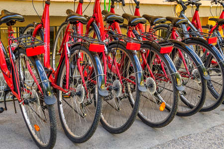 Varna, Bulgaria - May 29, 2020: Bicycle parking station full of bikes. Many parked bicycles