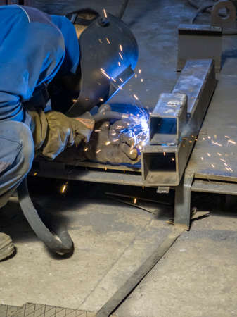 Welding Work with Equipment for Steel Metal, Iron, Sparks at Manufacturing Heavy Industry Factory,...