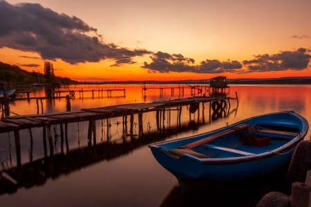 mood and tranquility with a moored boatの写真素材