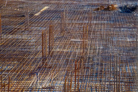 Billets of reinforcement at the construction site. New construction. Reinforced concrete construction.の写真素材