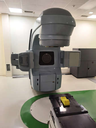 Medical advanced linear accelerator in oncological cancer therapy in a modern hospital. Vertical...