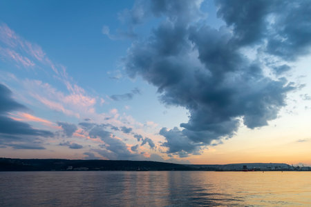 Exciting sunset. Beautiful colorful sky over the calm sea.