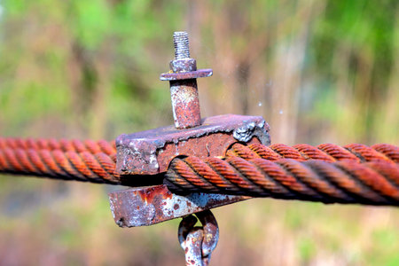 close-up of fastening the metal rope of the suspensionの写真素材