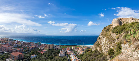 Panoramic view of the coast of Cefalu and fortress in la Roca in Sicily, Italy