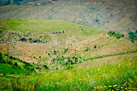 the medieval monastery is surrounded by a wall on the left Bank of the yeghegis river in Vayots Dzorの写真素材