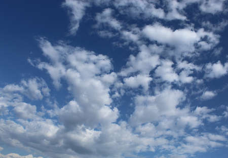 Very beautiful white clouds hover in the dark blue skyの写真素材