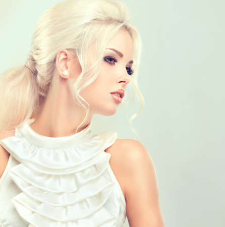 Beautiful model  with retro hair style , bouffant hair, and a bushy tailの写真素材