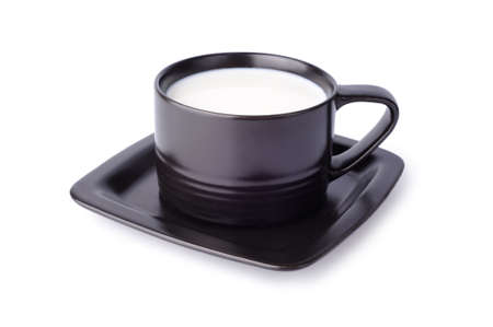 Black cup with milk isolated on white backgroundの写真素材