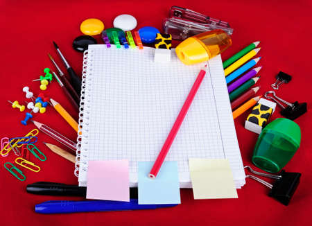 School education supplies items isolated on red backgroundの写真素材