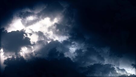 Epic thunderstorm clouds at night with lightning. Realistic black storm sky timelapse with powerful flashes and lights. Force of nature and dark environment 3D illustration. Severe weather backgroundの写真素材