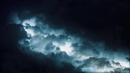 Epic thunderstorm clouds at night with lightning. Realistic black storm sky timelapse with powerful flashes and lights. Force of nature and dark environment 3D illustration. Severe weather backgroundの写真素材