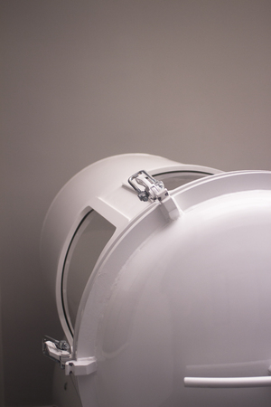 Hyperbaric Oxygen Therapy (HBOT) chamber tank used for specialised medical treatment for injuries in hospital clinic.Exterior clamp seals.の写真素材