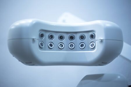 Dental instrumenation dentist equipment in denstists surgery clinic color photo in blue tones.の写真素材