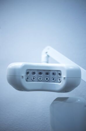 Dental instrumenation dentist equipment in denstists surgery clinic color photo in blue tones.の写真素材