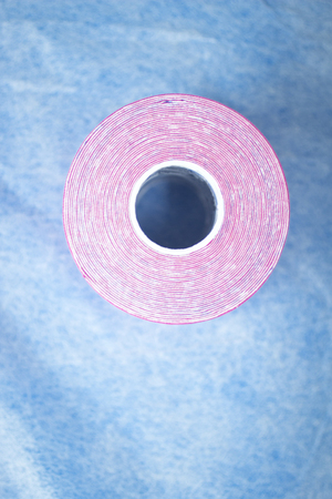Physiotape physiotherapy color tape bandage kinesiotape rolls for kinesiotaping taping treatment in real life hospital clinic medical center.の写真素材