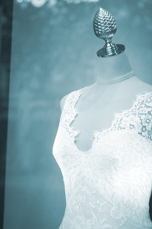 Shop bridal dummy bride fashion wedding mannequin in store boutique shop window artistic photo.の写真素材