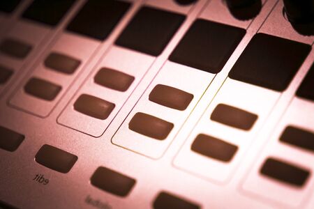 DJ console cd mp4 deejay mixing desk buttons and knobs in Ibiza house techno dance music wedding...