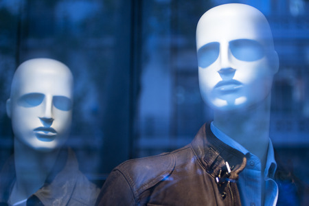 Shop male dummy mens fashion man mannequin in store boutique shop window artistic photo.の写真素材