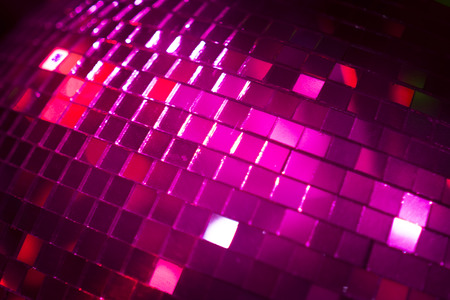 Disco ball in Ibiza house techno dance music wedding reception party in nightclub with colored lighting effect disco lights.の写真素材