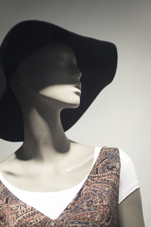 Shop dummy fashion mannequin in store boutique shop window artistic photo.の写真素材