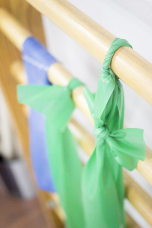 Physiotherapy and pilates elastic bands on wooden stretching rails in hospital medical center clinicの写真素材