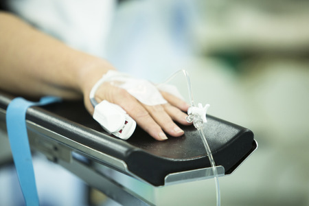 Patient hand immobilized in hospital emergency surgery emergency operating room medical clinic on...