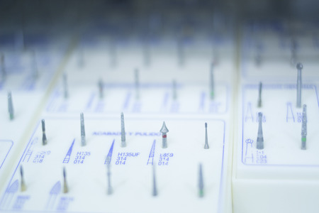 Dental equipment in dentist office clinic surgery used to treat tooth decay, fillings, gum disease and orthodontics treatments.の写真素材