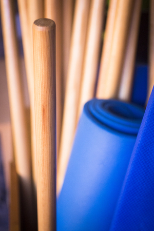 Pilates exercise fitness gym training yoga mats and poles in health club to develop strength,...