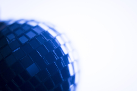 Disco ball in dance music wedding reception party in nightclub with colored lighting effect disco lights.の写真素材