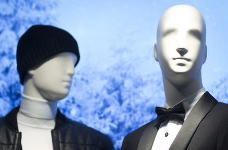 Shop dummy fashion mannequin in department store boutique window wearing Shop dummy in evening suit dinner jacket and bow tie.の写真素材