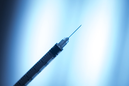 Phials of pharmaceutical insulin medication U-40 syringe photo.の写真素材