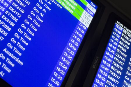 Airport departures arrivals board  light panel board giving information about flights in departure...