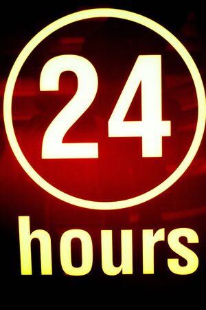 Twenty four 24 hours open sign light in store.の写真素材