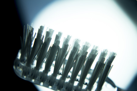 Traditional hand dental toothbrush head for teeth cleaning, plaque removal and dental hygiene photo.