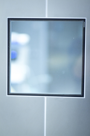 Hospital surgery emergency operating room metal door photo.の写真素材
