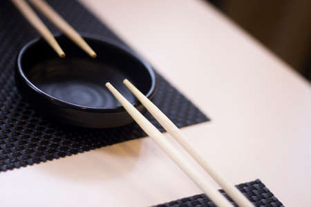Traditional Japanese wooden oriental chopsticks used to eat Asian and Chinese food.の写真素材