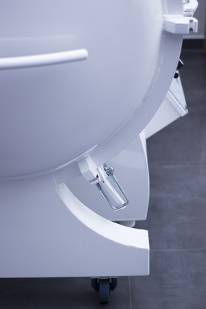Hyperbaric oxygen therapy HBOT chamber tank in medical hospital clinic used to treat patients