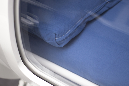 Hyperbaric oxygen therapy HBOT chamber tank in medical hospital clinic used to treat patients