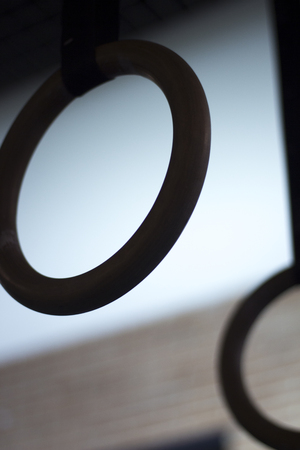 gymnasium rings in crossfit, bodybuilding and weight training weights gym.の写真素材