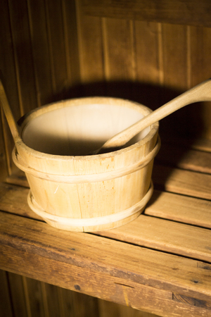Wood sauna bucket and ladle spoon photo.の写真素材