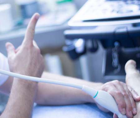 EPI percutaneous intratissue electrolysis scan to aid dry needling acupunture physiotherapy physical therapy treatment of patient in clinic.の写真素材