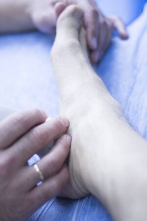 EPI percutaneous intratissue electrolysis scan to aid dry needling acupunture physiotherapy physical therapy treatment of patient in clinic.の写真素材