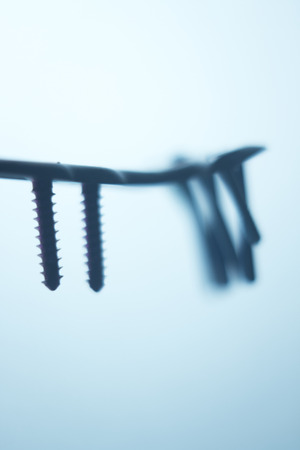 Orthopedics and Traumatology surgery plate & screws surgical titanium metal implant close-up isolated.の写真素材