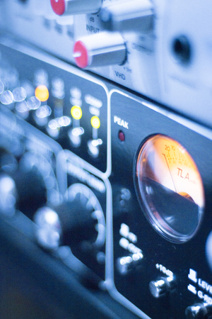 Professional sound recording audio studio digital equipment, amplifier, knobs and graphic equalizer controls.の写真素材